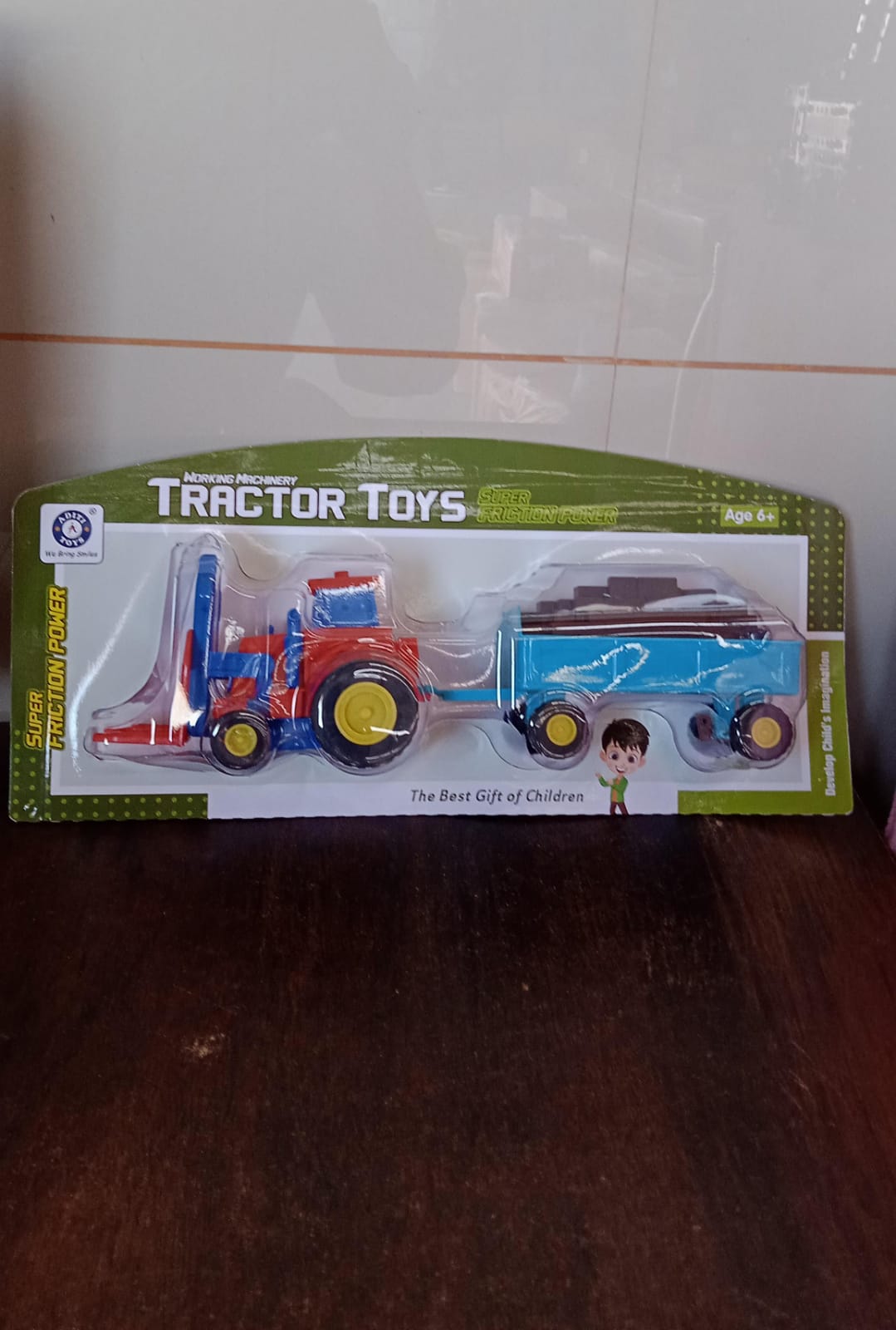 Plastic Tractor Toy Friction Powered Tractor with Bricks Trolley (1 Pc) Plastic Tractor Toy Friction Powered Tractor with Bricks Trolley (1 Pc)